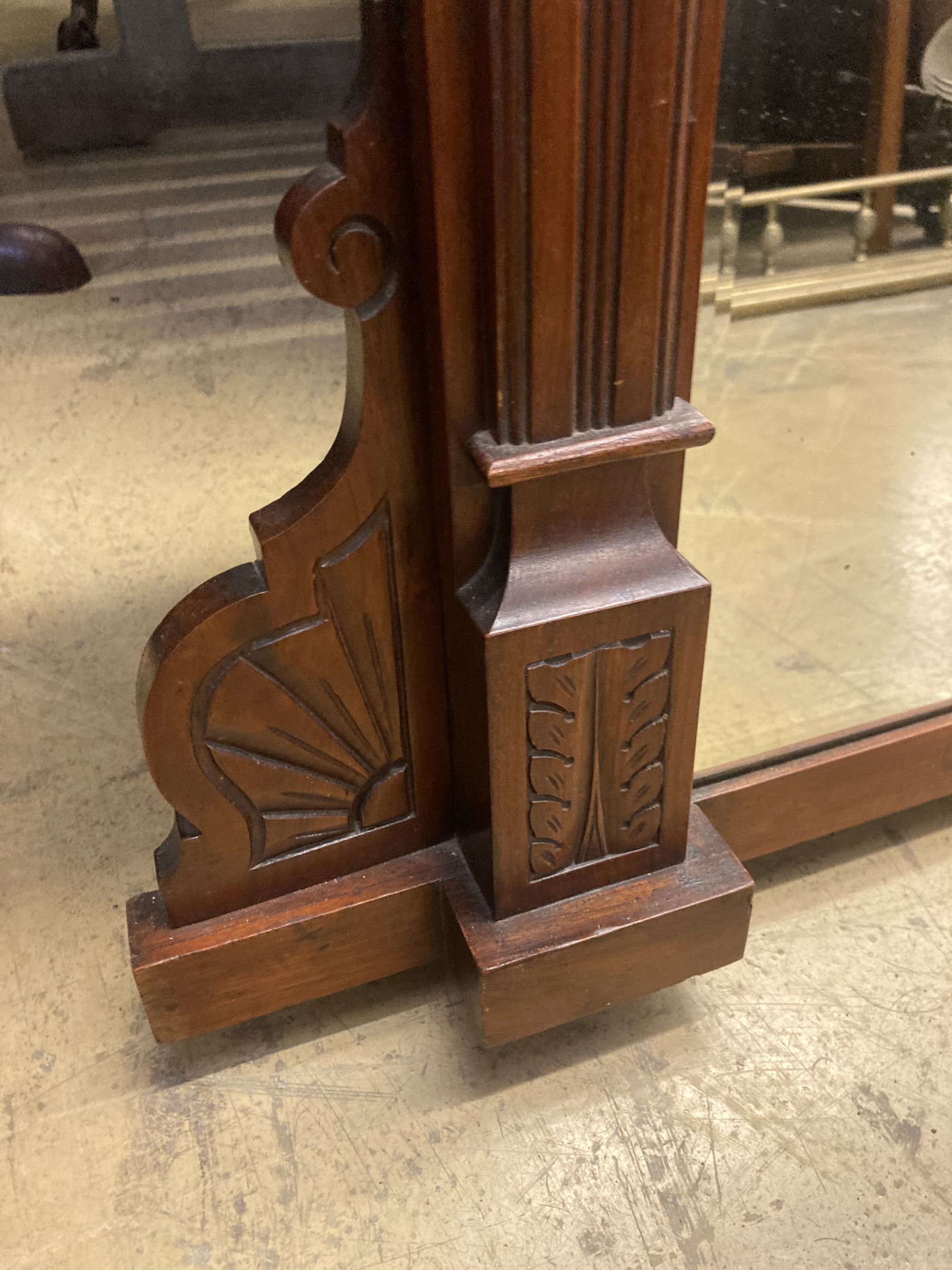 A late Victorian mahogany overmantel mirror, width 115cm, height 147cm